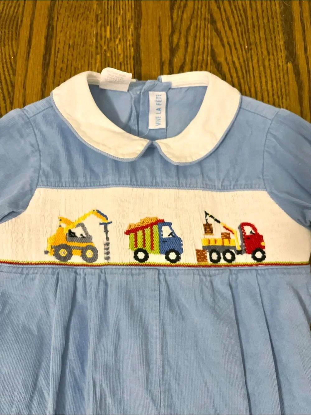 Vive La Fête Light Blue Smocked Baby Romper with Trucks